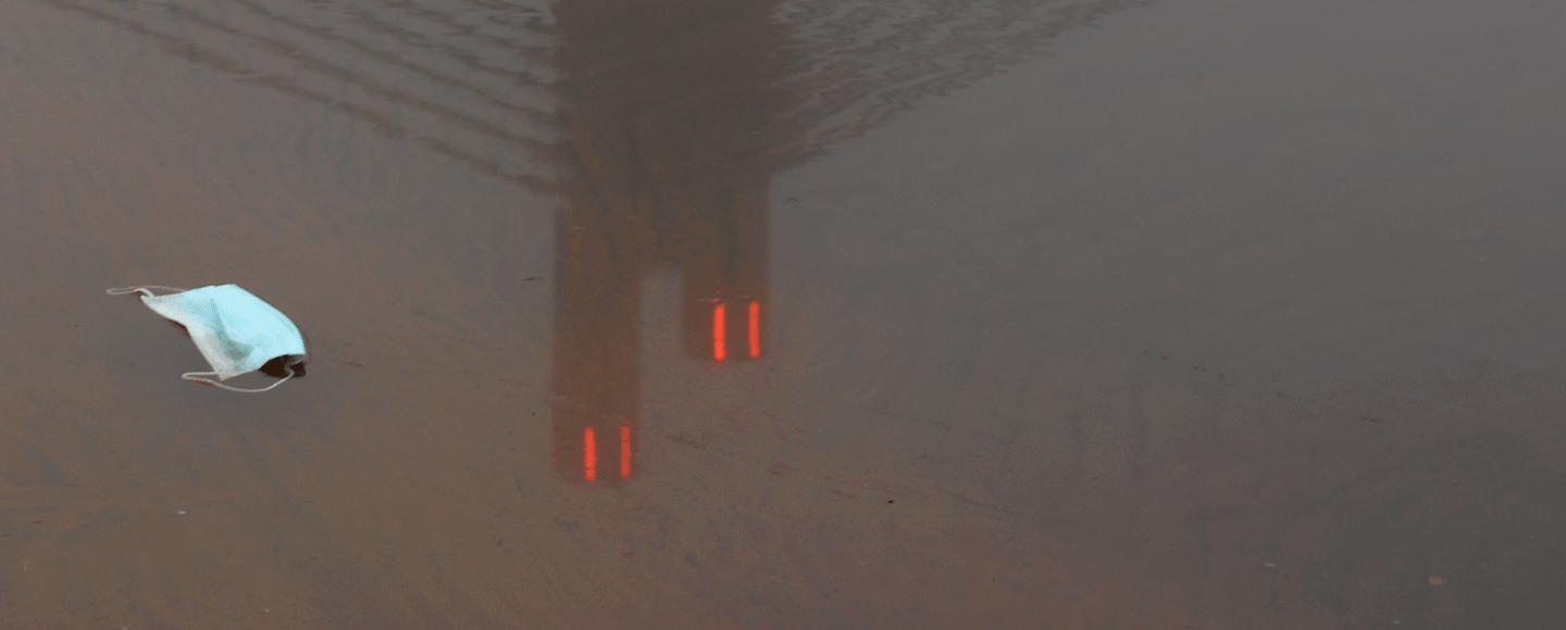 face mask at water near Jätkänkynttilä, a famous bridge at Rovaniemi